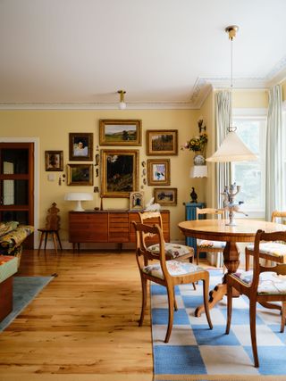 Image may contain Architecture Building Dining Room Dining Table Furniture Indoors Room Table Wood and Home Decor