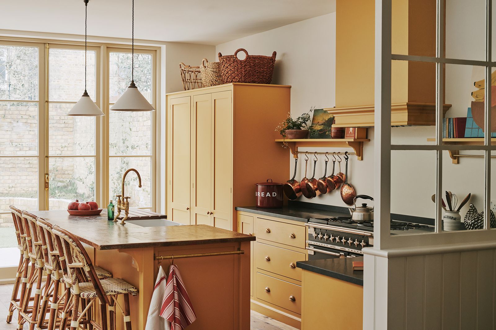 Image may contain Furniture Room Indoors Interior Design Kitchen Wood Kitchen Island and Shelf