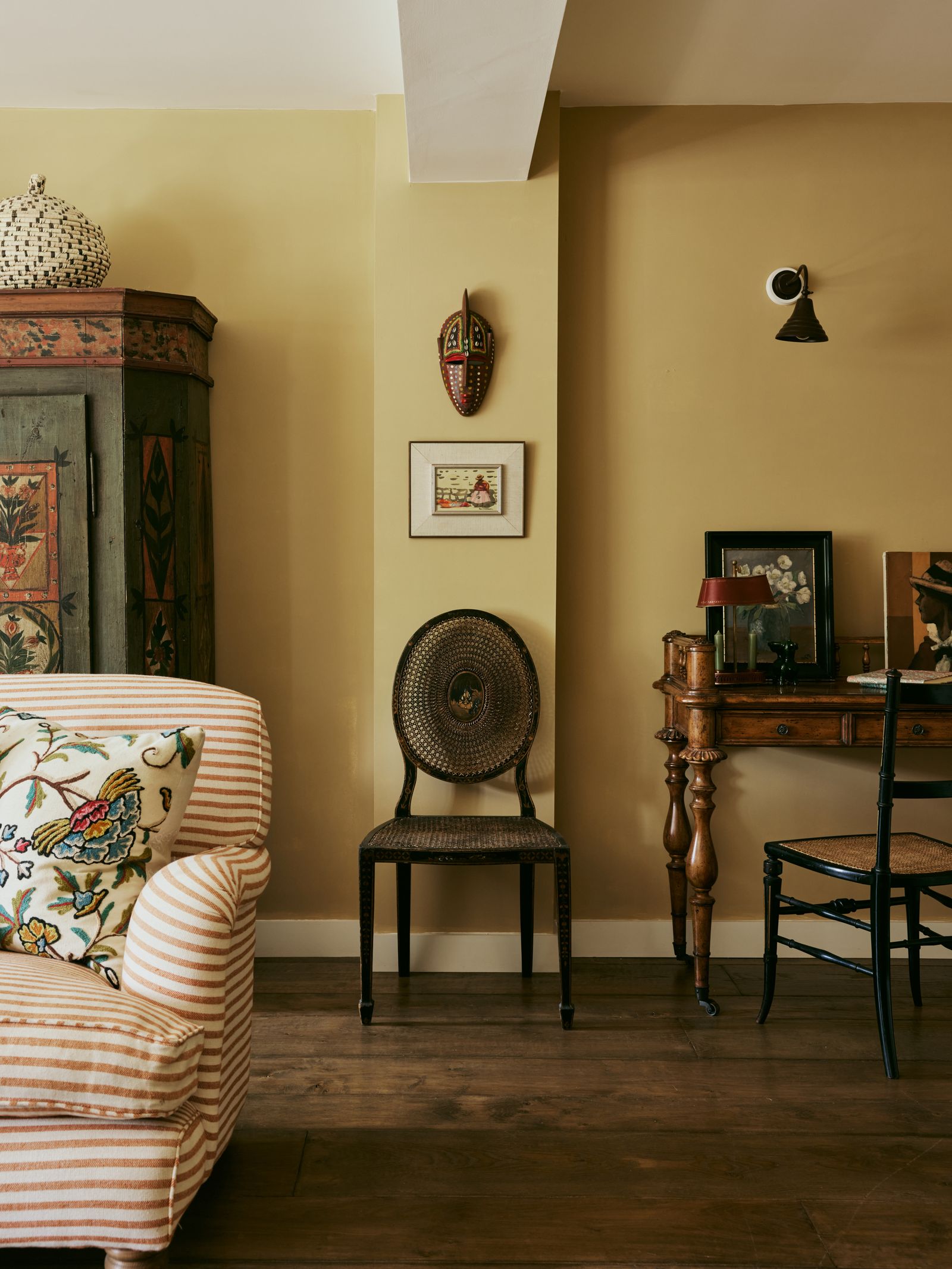 The sitting room of interior designer Lucy Cunningham's Hampshire cottage is a lesson in using yellow as a neutral.
