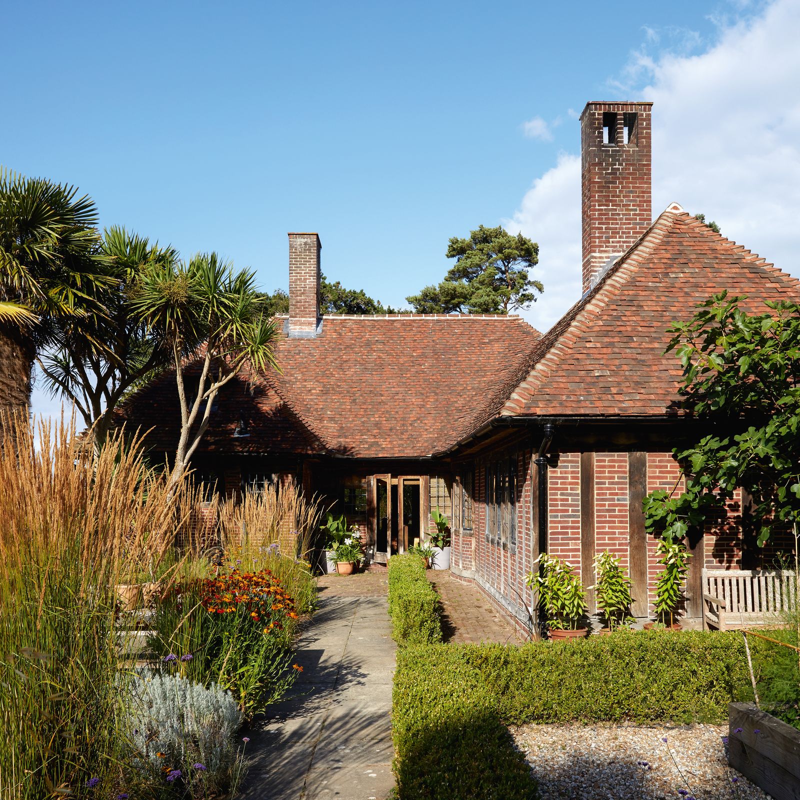A textile designer's clifftop cottage in a charming Arts & Crafts style